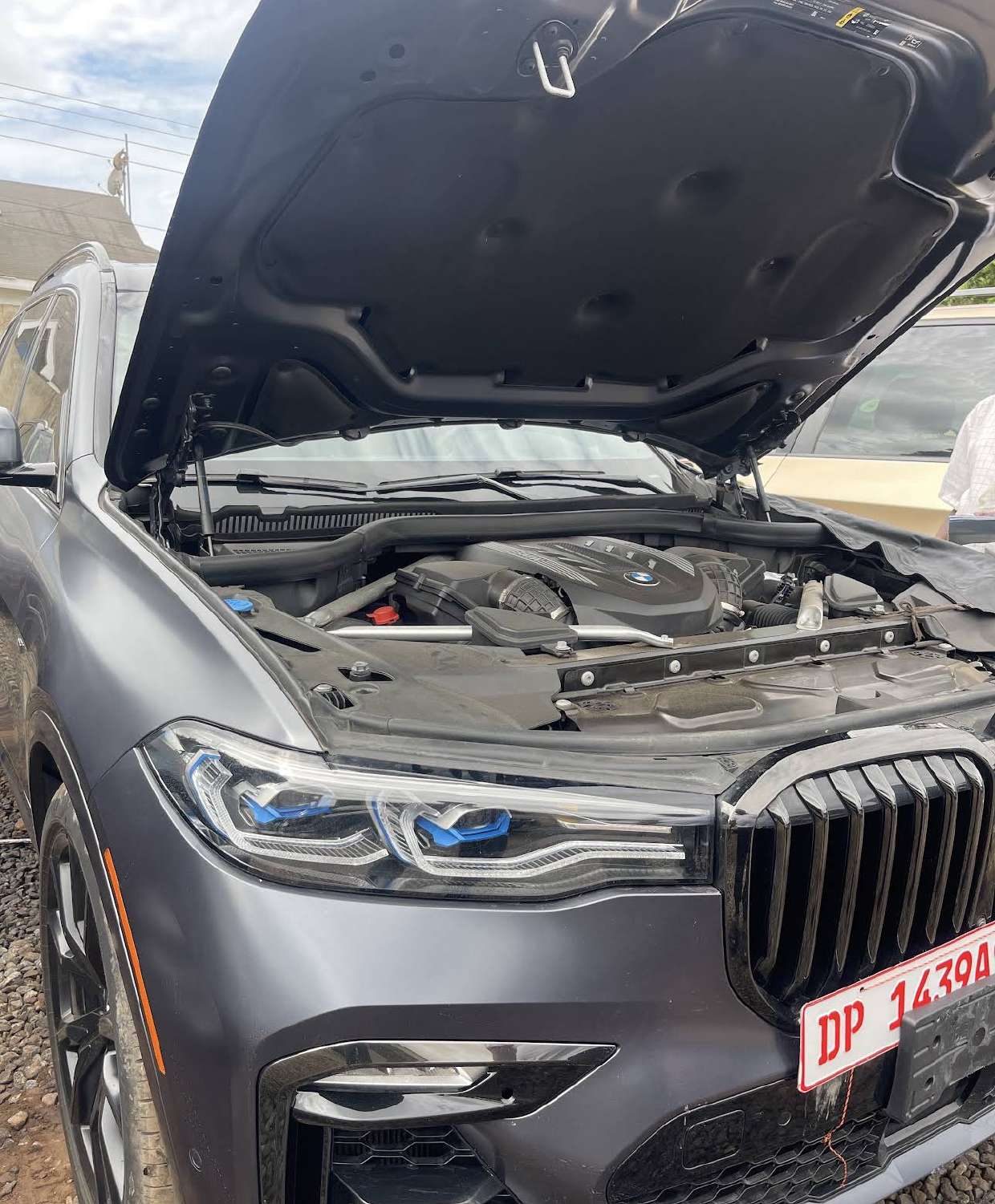 Vehicle under service with the hood open